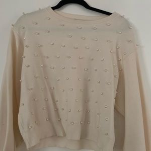 Sweater with white pearls